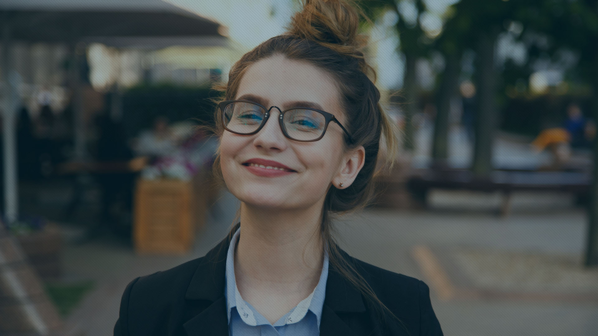 Business woman in suit portrait during travel for company meeting outdoor brunette with glasses.